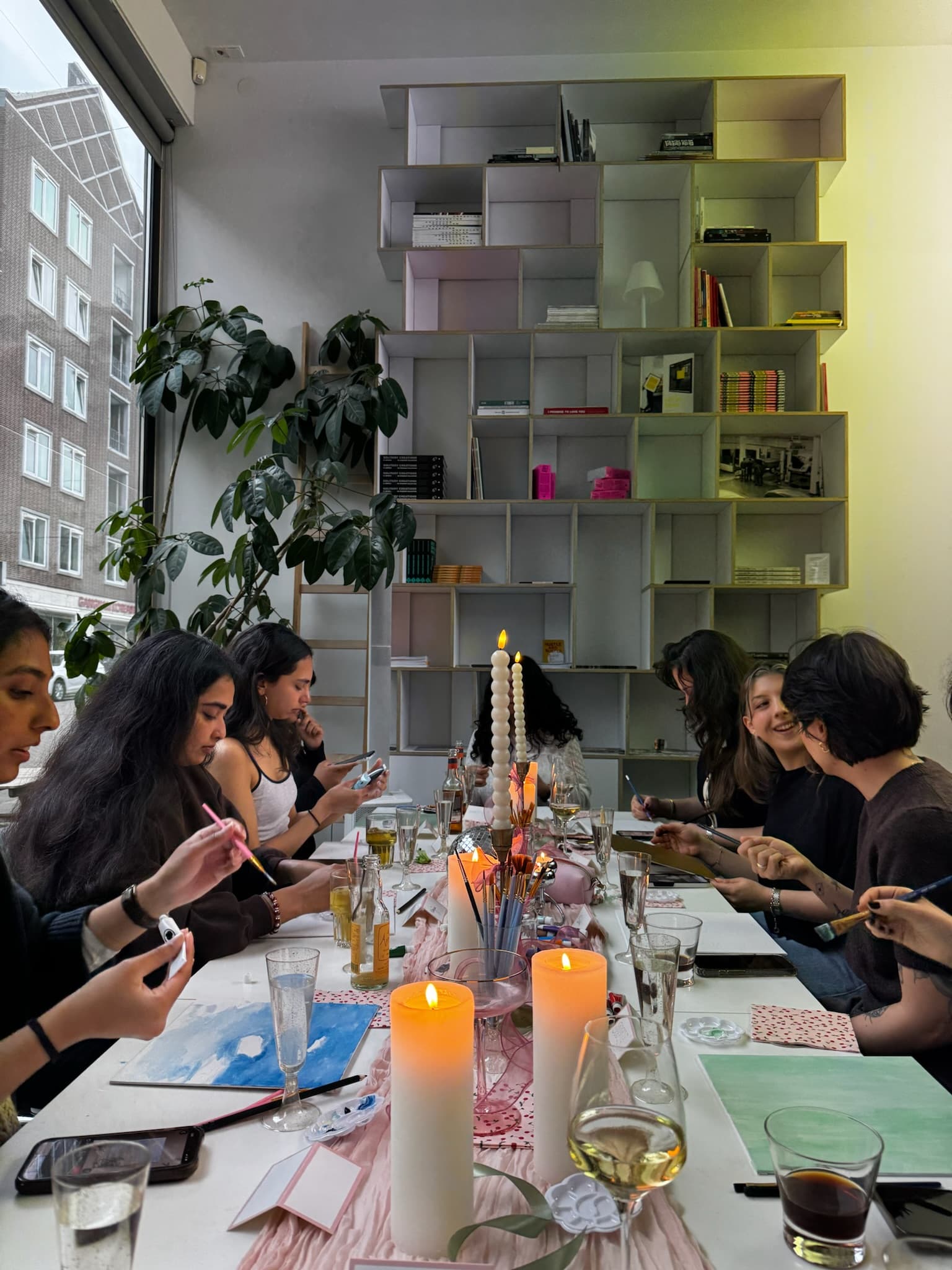 The whole table, mid-brushstroke — The Link, Rotterdam